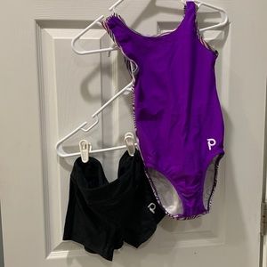 Girls size large purple Plum leotard with black shorts